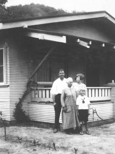 William Weinland and his family (along with his visiting mother) in front of their San Francisquito Canyon bungalow prior to their death. From the Weinland Collection at the Huntington Library